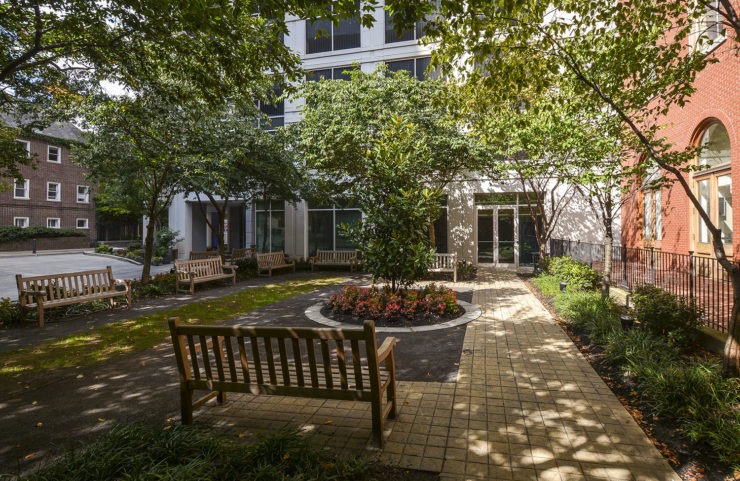 shaded courtyard with benches and walkways