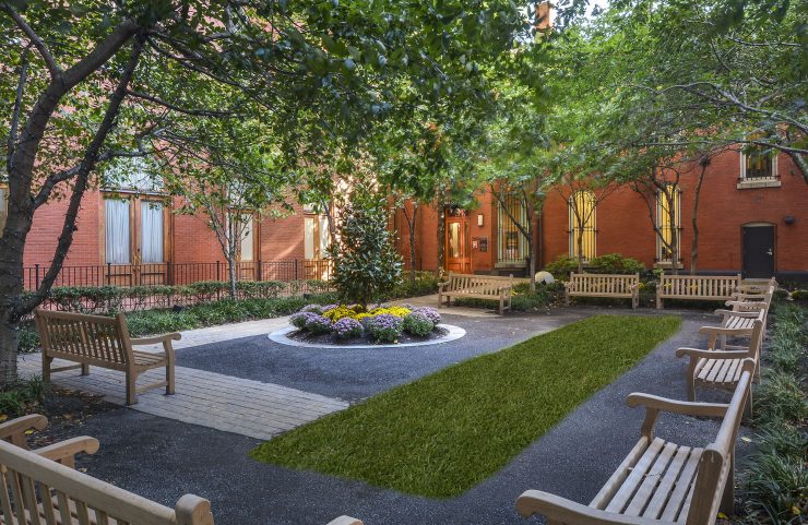 courtyard with tons of benches to enjoy nature