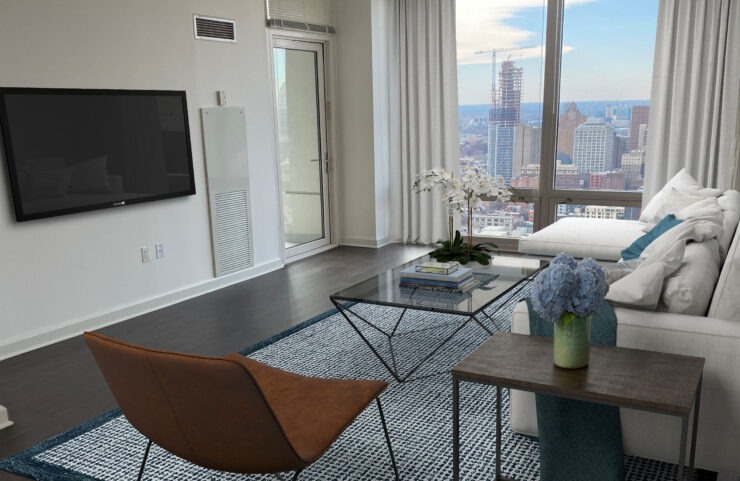 living room with large floor to ceiling windows to capture the view of philly
